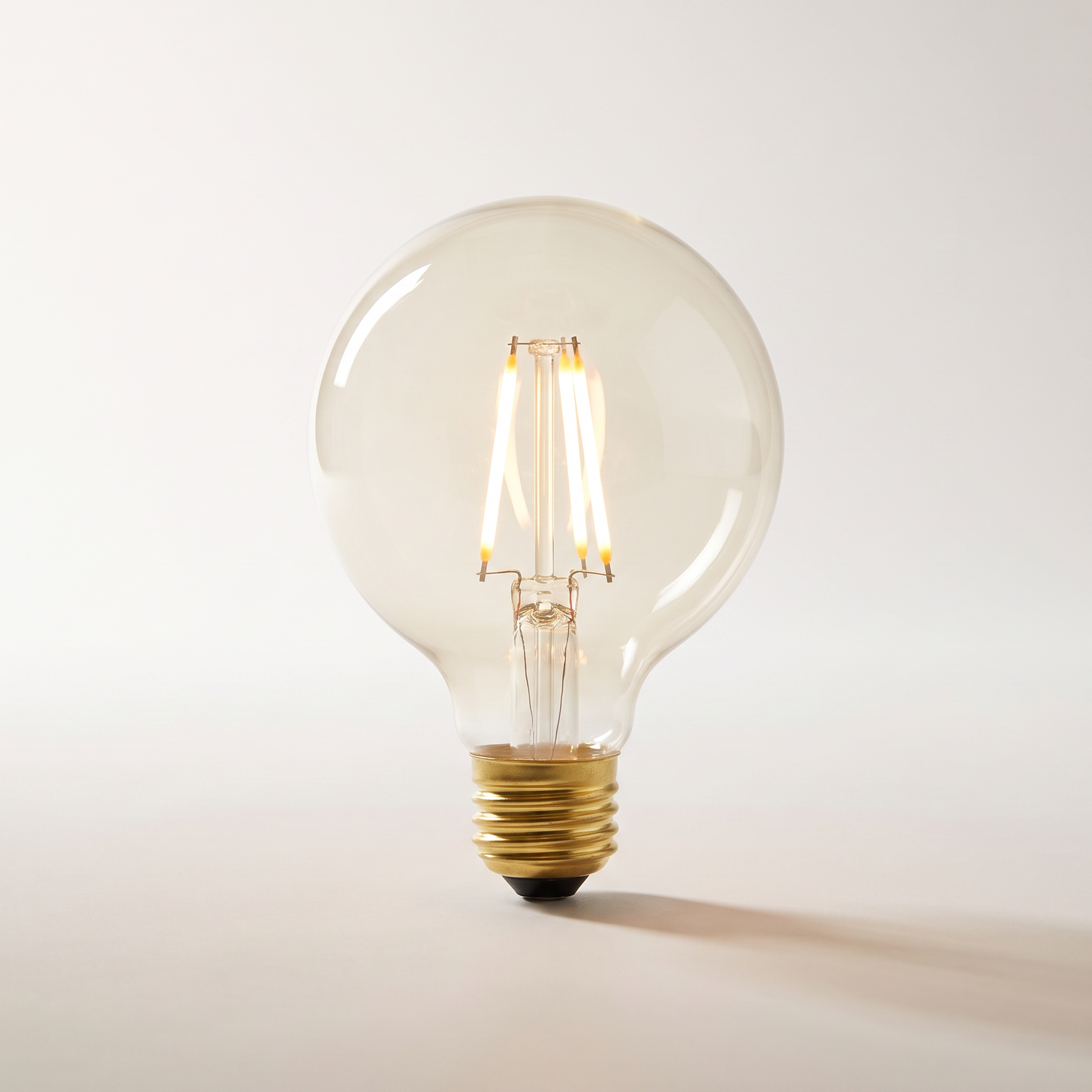 Xtricity LED G40 Globe Smoked Filament Bulb, 5W Ultra-Warm 2200K, E26, Dimmable