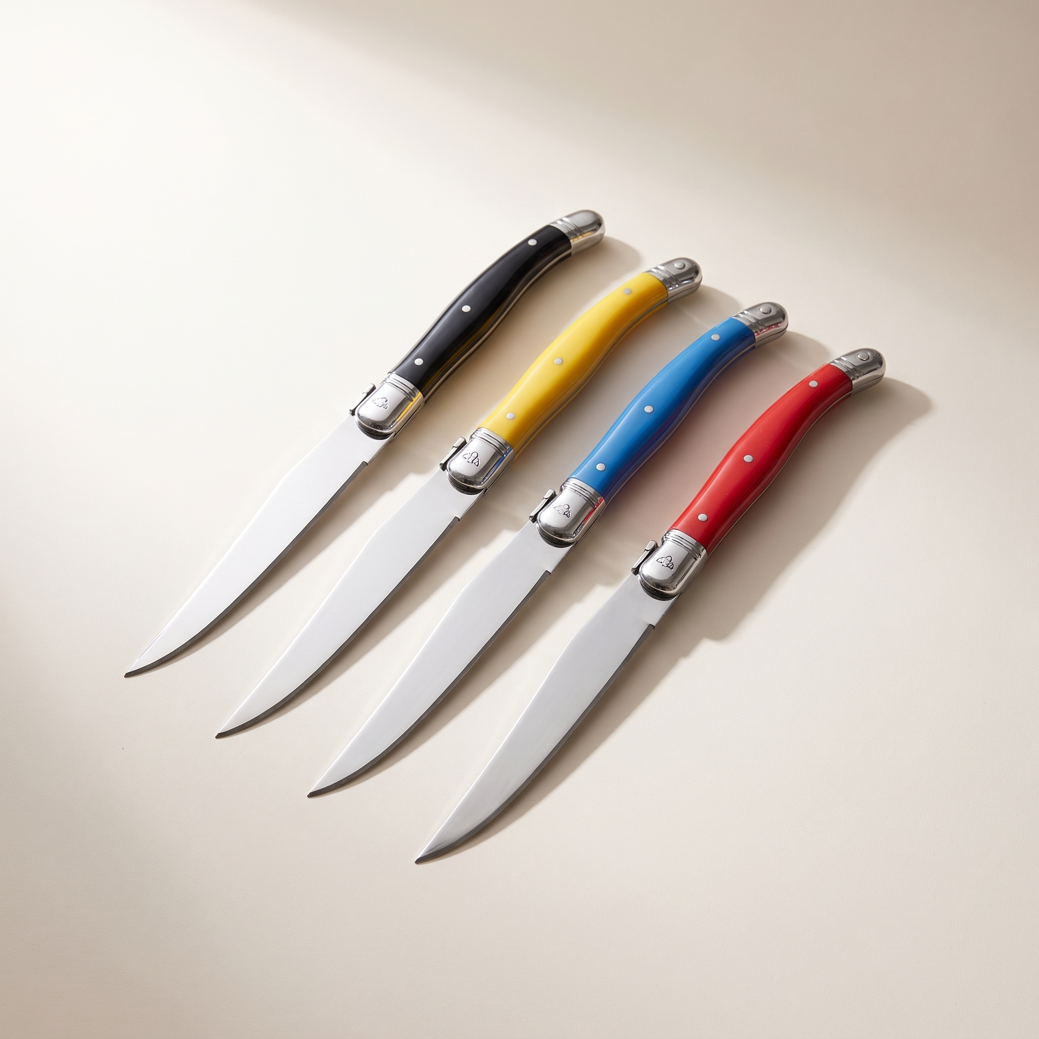 Ensemble de 4 couteaux à steak Laguiole – Manches multicolores