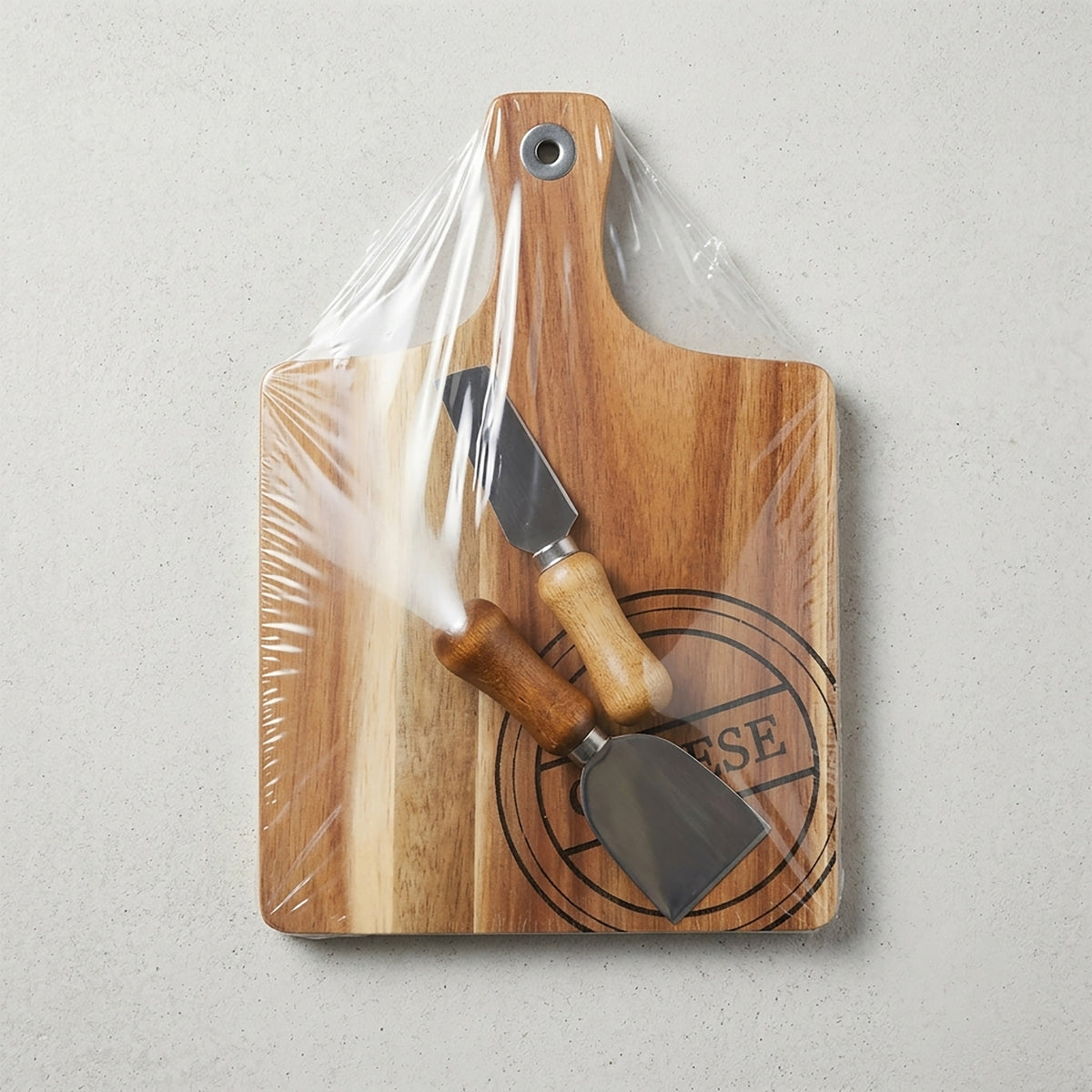 Acacia Wood Paddle Cheese Board with 2 Cheese Knives packaging