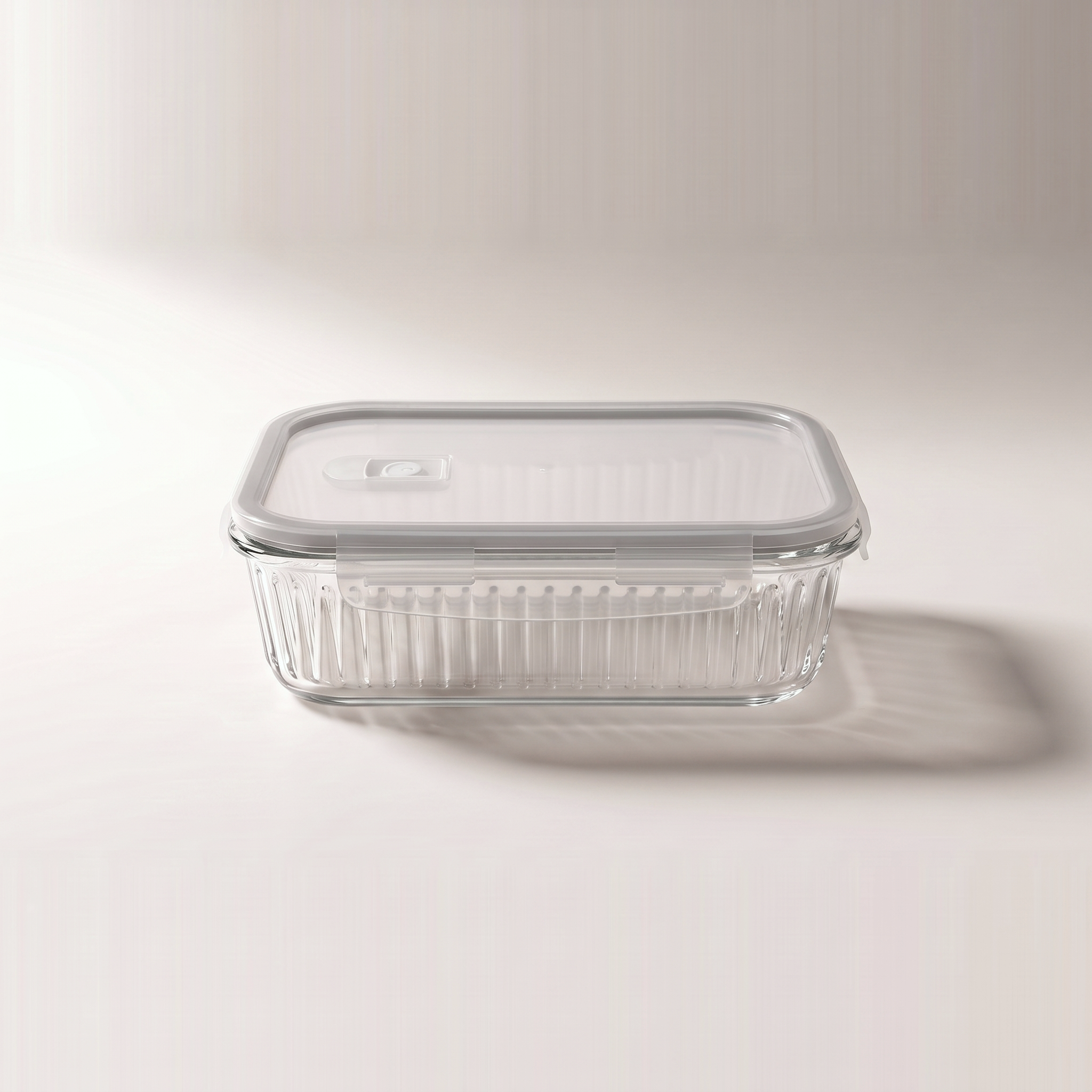 Set of 4 round nested food storage containers with clear-centre coloured lids