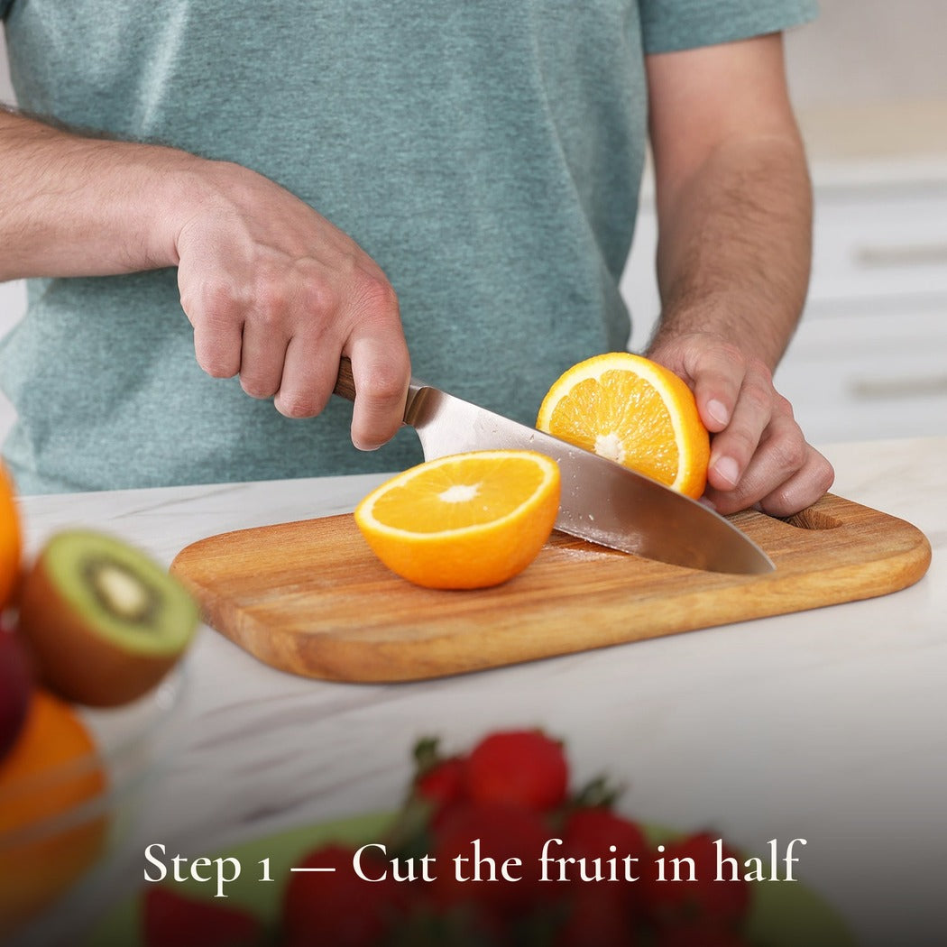 Step 1 — Cut the fruit in half — Cordless Fruit Squeezer