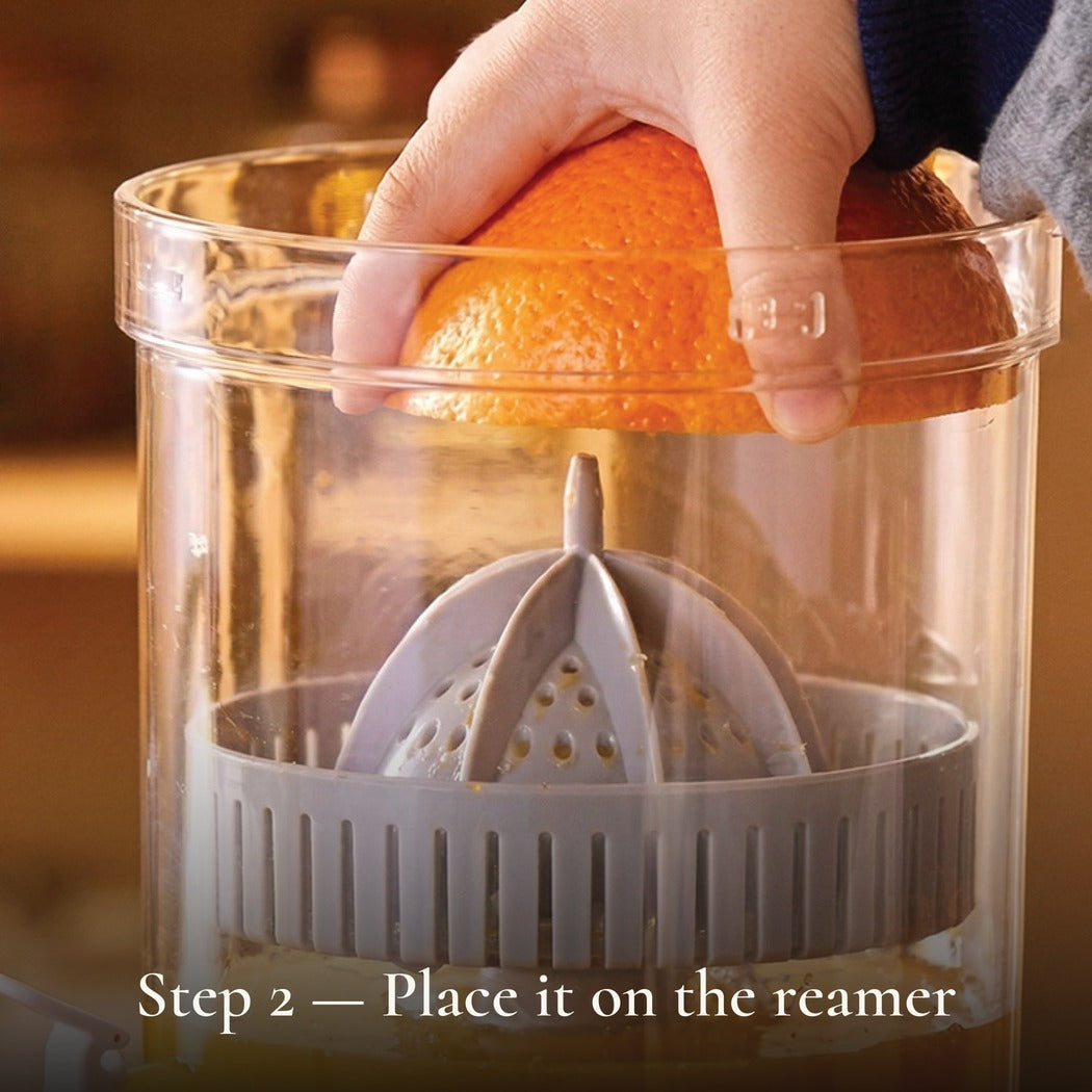 Step 2 — Place it on the reamer — Cordless Fruit Squeezer